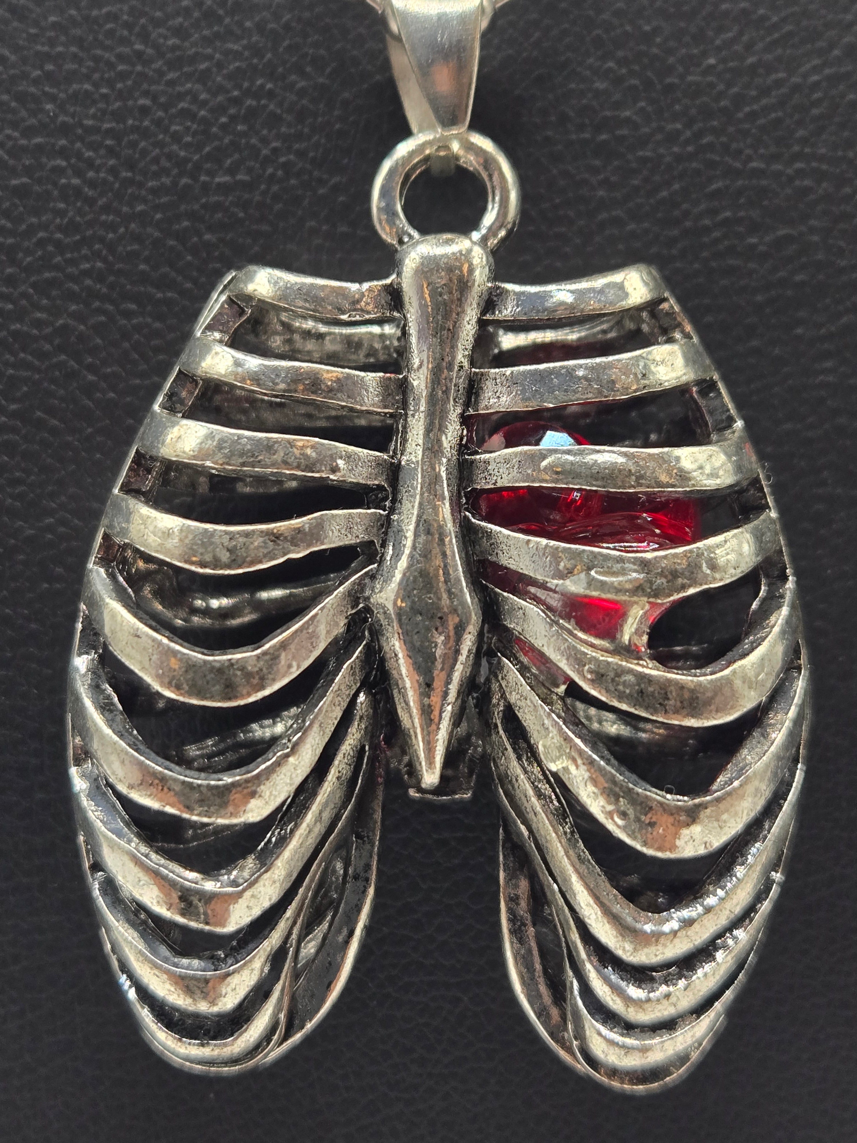 MR. BONES' RIB CAGE/CRYSTAL HEART PENDANT